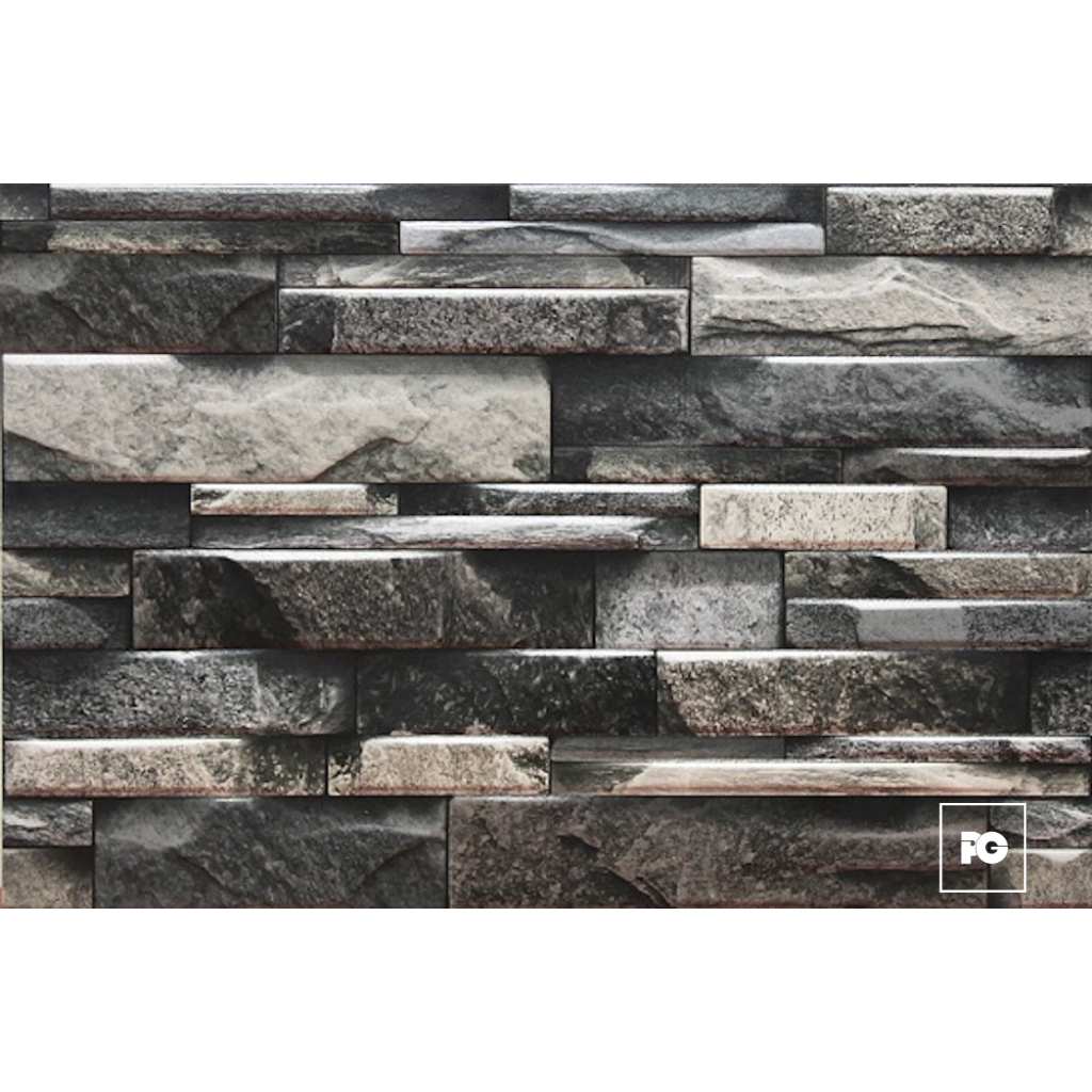 Fachaleta tipo piedra_30x45_alameda_plomeria garcia_ok | Plomería García Gray stacked-stone wall veneer with irregular rectangular stones in varying shades of gray to create a textured facade.