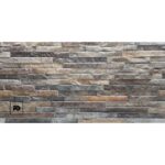 Stone veneer wall with irregular gray-brown stones and a small black fg logo in a square at the lower-left corner